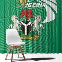 Close-up green Nigeria-themed window curtain fabric with crest emblem and wavy stripes