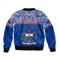 Blue bomber jacket with MANU SAMOA print, crest graphic, tribal patterns, zip front