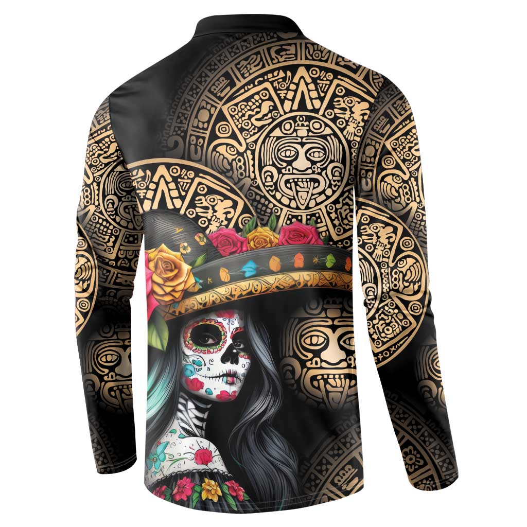 Black sweatshirt showing back Aztec medallion and colorful skull portrait graphic panel.