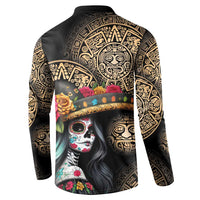 Black sweatshirt showing back Aztec medallion and colorful skull portrait graphic panel.