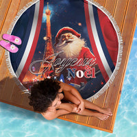 Round blue beach blanket with Santa, Eiffel Tower, and Joyeux Noel print