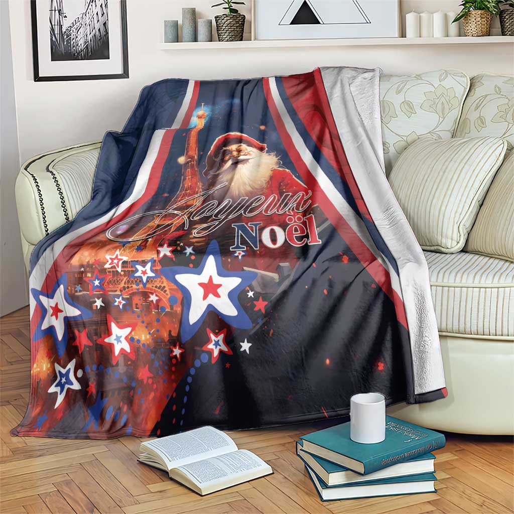 Blue Christmas blanket with Eiffel Tower, Santa, stars, and red white striped border