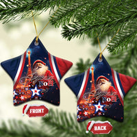 Blue star-shaped ceramic ornament with Santa and “Joyeux Noel”, front and back