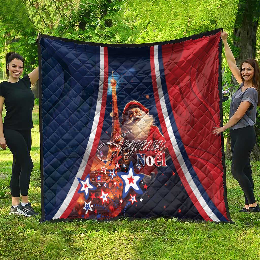 Folded navy and red quilt with white stripes, Santa face and 'Joyeux Noel' text