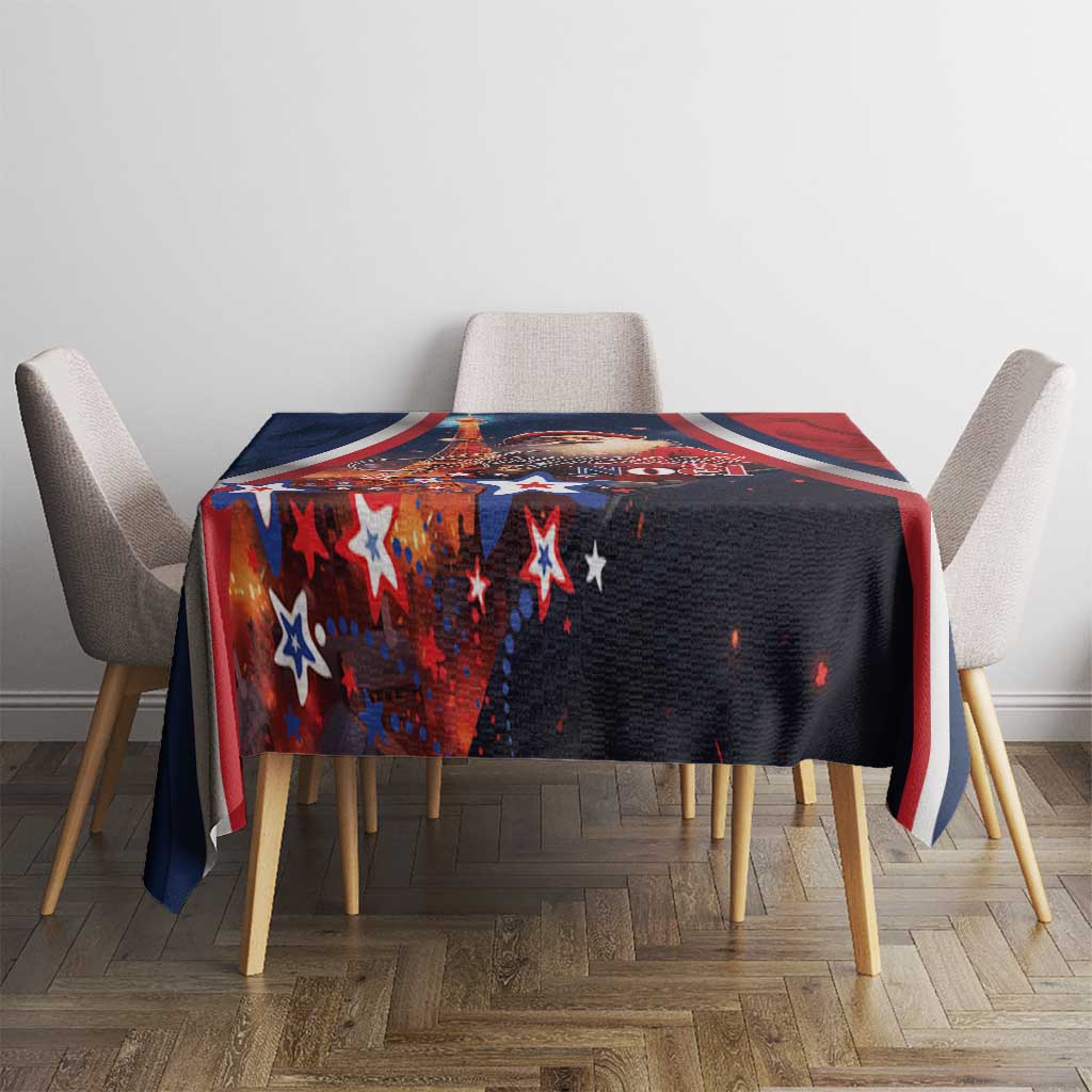 Christmas tablecloth on dining table, dark navy with red accents and star shapes