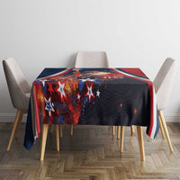 Christmas tablecloth on dining table, dark navy with red accents and star shapes