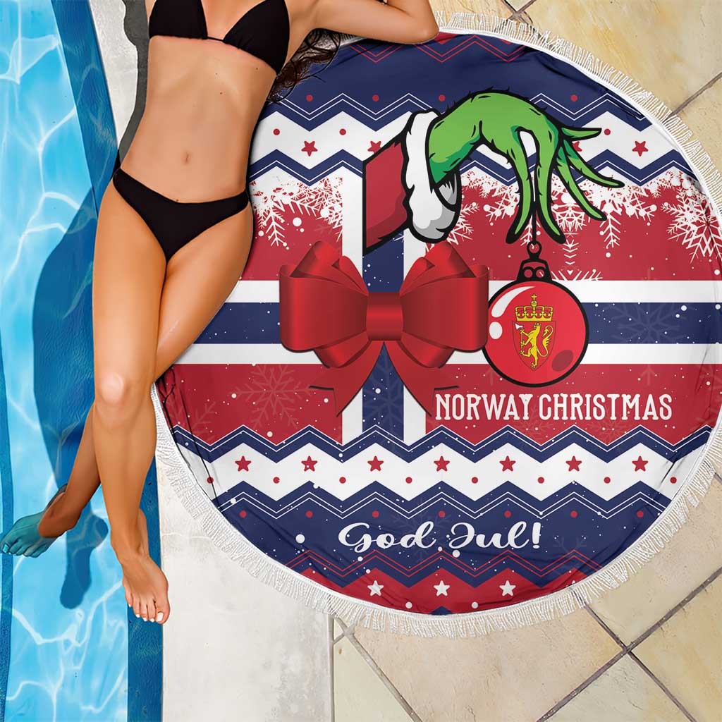 Round beach blanket with fringe, navy and red festive print, laid over bikini model