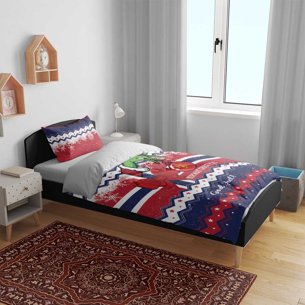 Christmas bedding set on bed with red, white, blue Norway pattern, character and bow