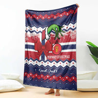 Blue and red Nordic Christmas throw blanket with reindeer and bow