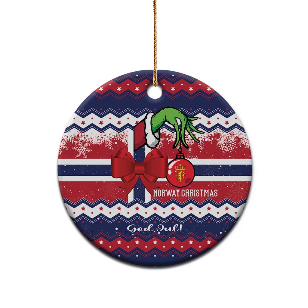 Round dark blue ceramic ornament with red bow, green figure, "God Jul" and gold loop