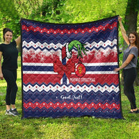 Norway Christmas quilt spread out outdoors, blue red white zigzag design with reindeer