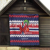 Norway Christmas quilt hanging on a wall with blue red white pattern and reindeer