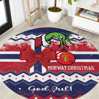 Blue round Christmas rug with red bow, green goat, and 'God Jul!' Norway text