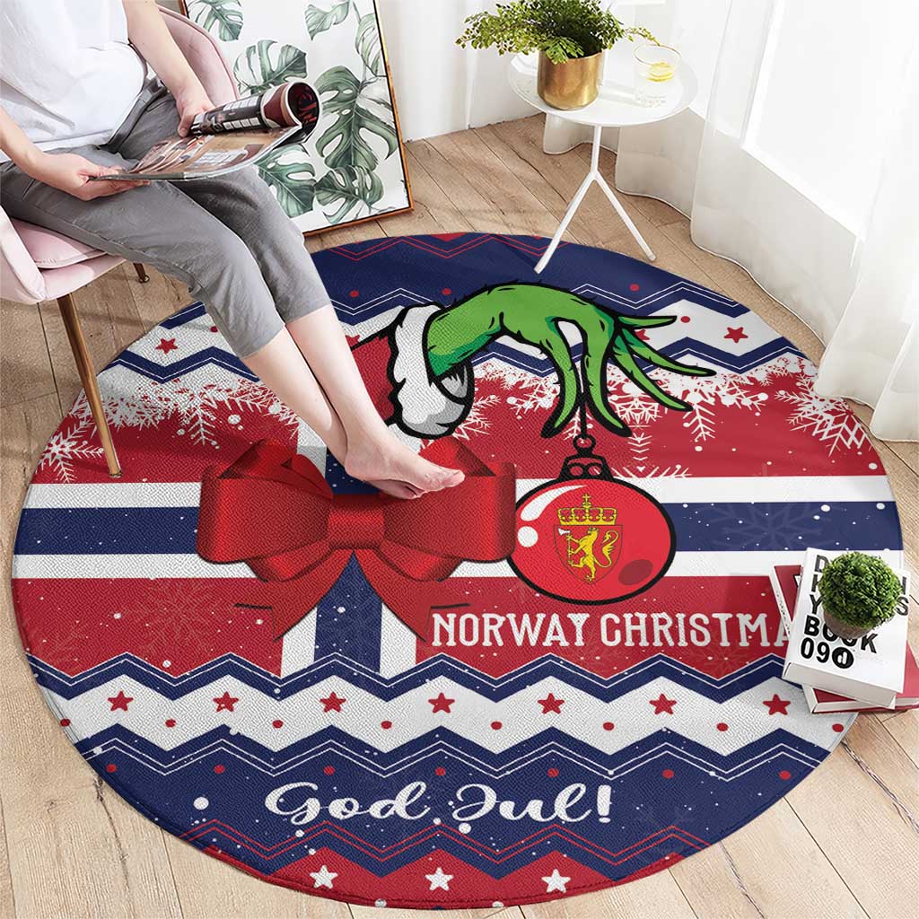 Round Christmas rug in blue and red with red bow, goat, and Norway Christmas badge