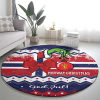 Blue and red round Christmas rug with green goat, ornament, and 'God Jul!'