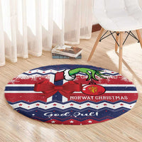 Blue and red round Christmas rug with red bow, green goat, and 'Norway Christmas' text