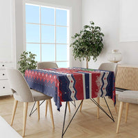 Christmas tablecloth on rectangular dining table in navy, red and white with zigzag and star motifs