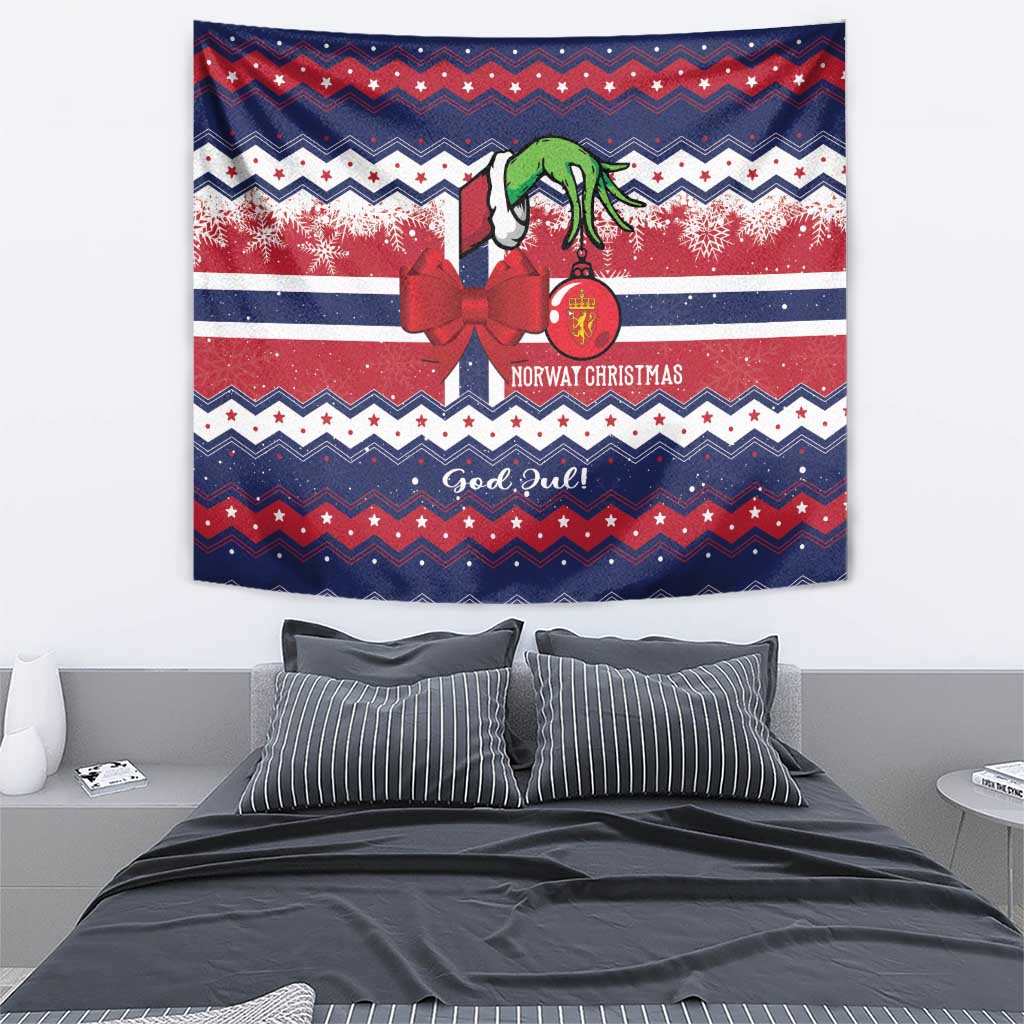Blue Norway Christmas tapestry with red bow, green figure, snowflake bands, and zigzag trim
