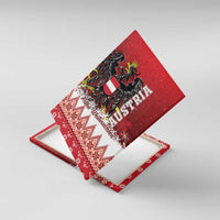 Red canvas wall art with Austrian eagle crest and red-white geometric 'Frohe Weihnachten'.