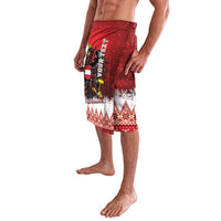 Red Christmas board shorts with eagle print and patterned fair isle hem