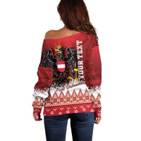 Red off-shoulder Christmas sweater for women with bold eagle and festive pattern