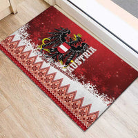 Red Christmas eagle rubber doormat featuring a black coat-of-arms emblem and festive border.