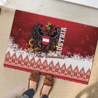 Red Christmas eagle rubber doormat with black emblem, snow pattern band, and border design.