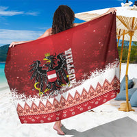 Red Christmas eagle sarong with snowflake and zigzag border trim