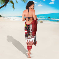 Red Christmas eagle sarong wrap, front view with festive border