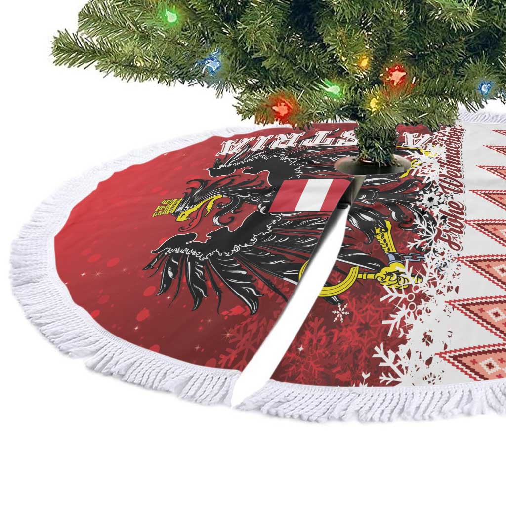 Red round tree skirt with black eagle crest, white snowflake graphics, and white fringe edge.
