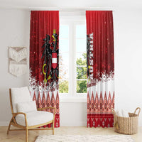 Red Christmas window curtains with Austrian eagle and snowflake scenes across the lower section