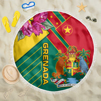 Circular Grenada beach blanket with colorful emblem and fringe edge.