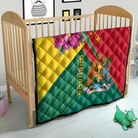 Grenada flag quilt blanket on toddler bed, quilted stitching with crest emblem and “GRENADA” text