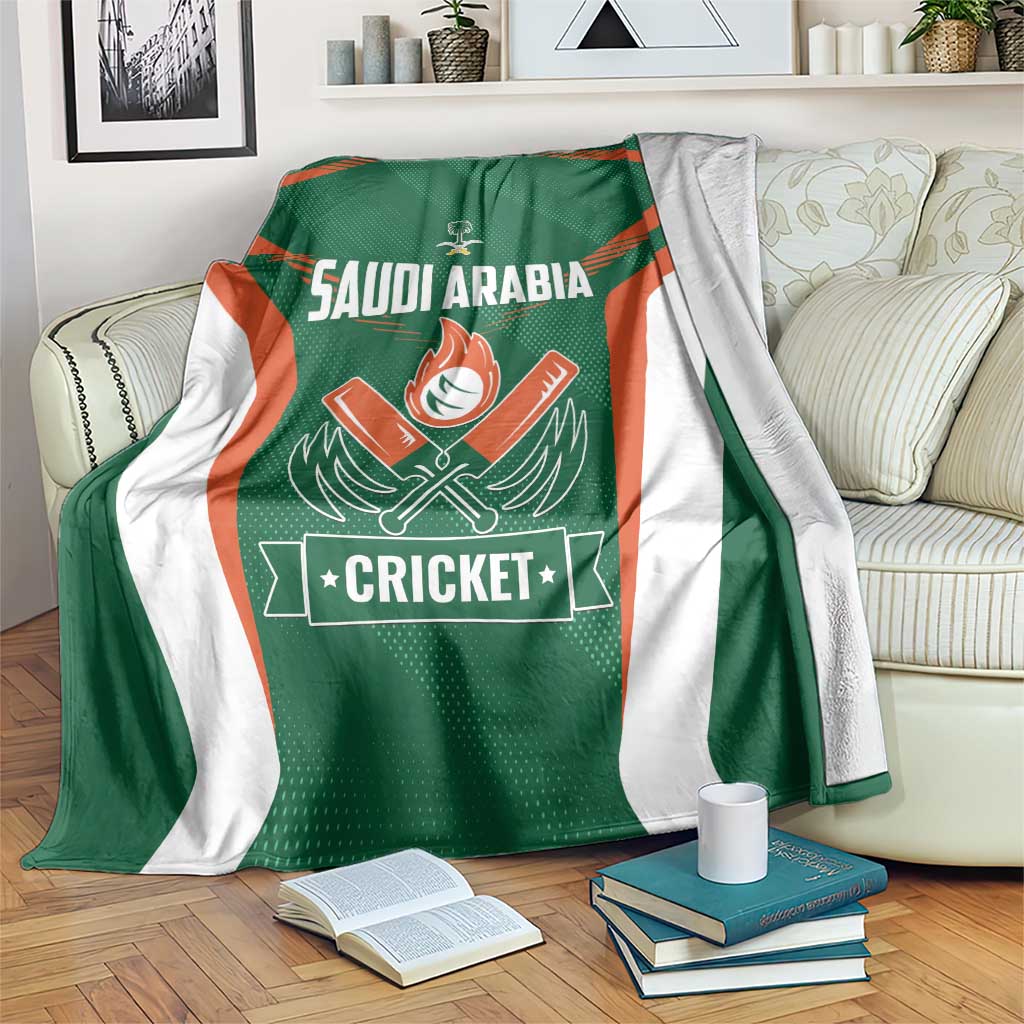 Green cricket team blanket with white panels, orange stripes, Saudi Arabia and Cricket emblem
