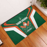 Green rubber cricket doormat with Saudi Arabia Cricket logo, full design visible