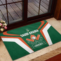 Green rubber cricket doormat with Saudi Arabia Cricket emblem by doorway