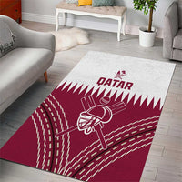 Red Qatar cricket area rug with white geometric arcs and central cricket player