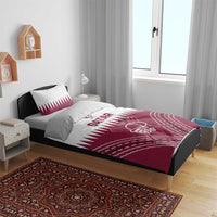 Red and white Qatar cricket bedding set on bed, duvet with QATAR logo and cricket helmet graphic