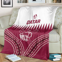 Qatar cricket blanket with white top and maroon bottom, batting helmet logo