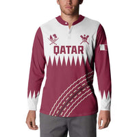 Maroon and white cricket button sweatshirt with QATAR front graphic, worn by model