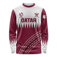 Maroon and white long-sleeve cricket shirt with Qatar logo and chevron graphics