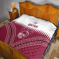 Qatar cricket quilt on bed, white upper section with red Qatar text and helmet icon