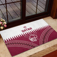 Red and white Qatar cricket rubber doormat with central cricket player graphic