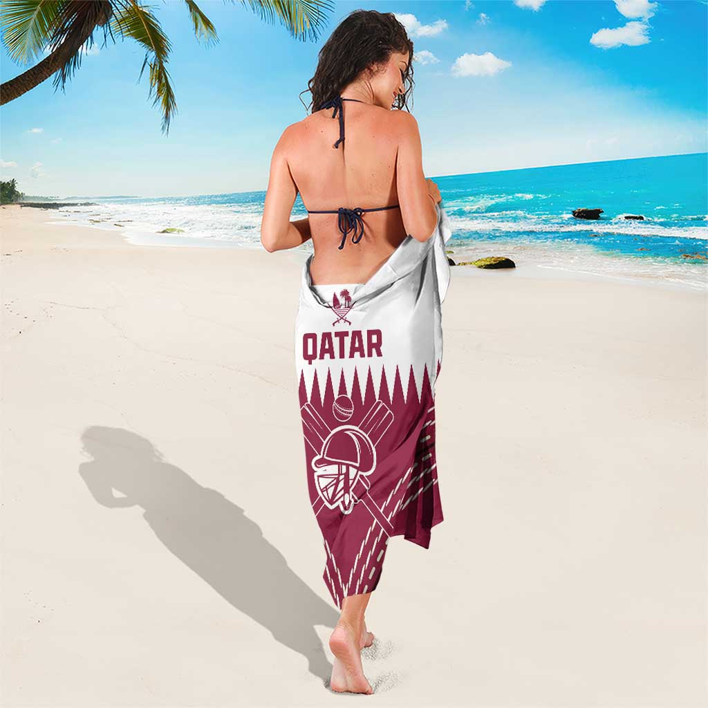 Qatar cricket sarong, back view; maroon and white with Qatar crest and stripes