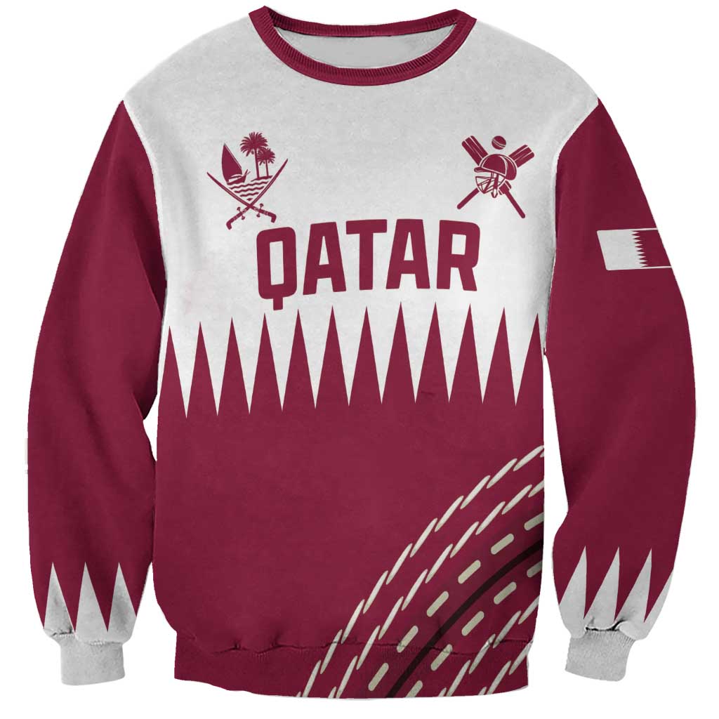 Boys crewneck sweatshirt with maroon and light gray paneling and Qatar graphic on front