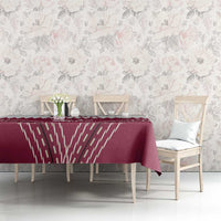 Maroon red tablecloth with white Qatar cricket logo and zigzag stripe design