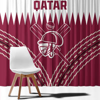Close-up Qatar cricket curtain fabric showing maroon background and white player graphic