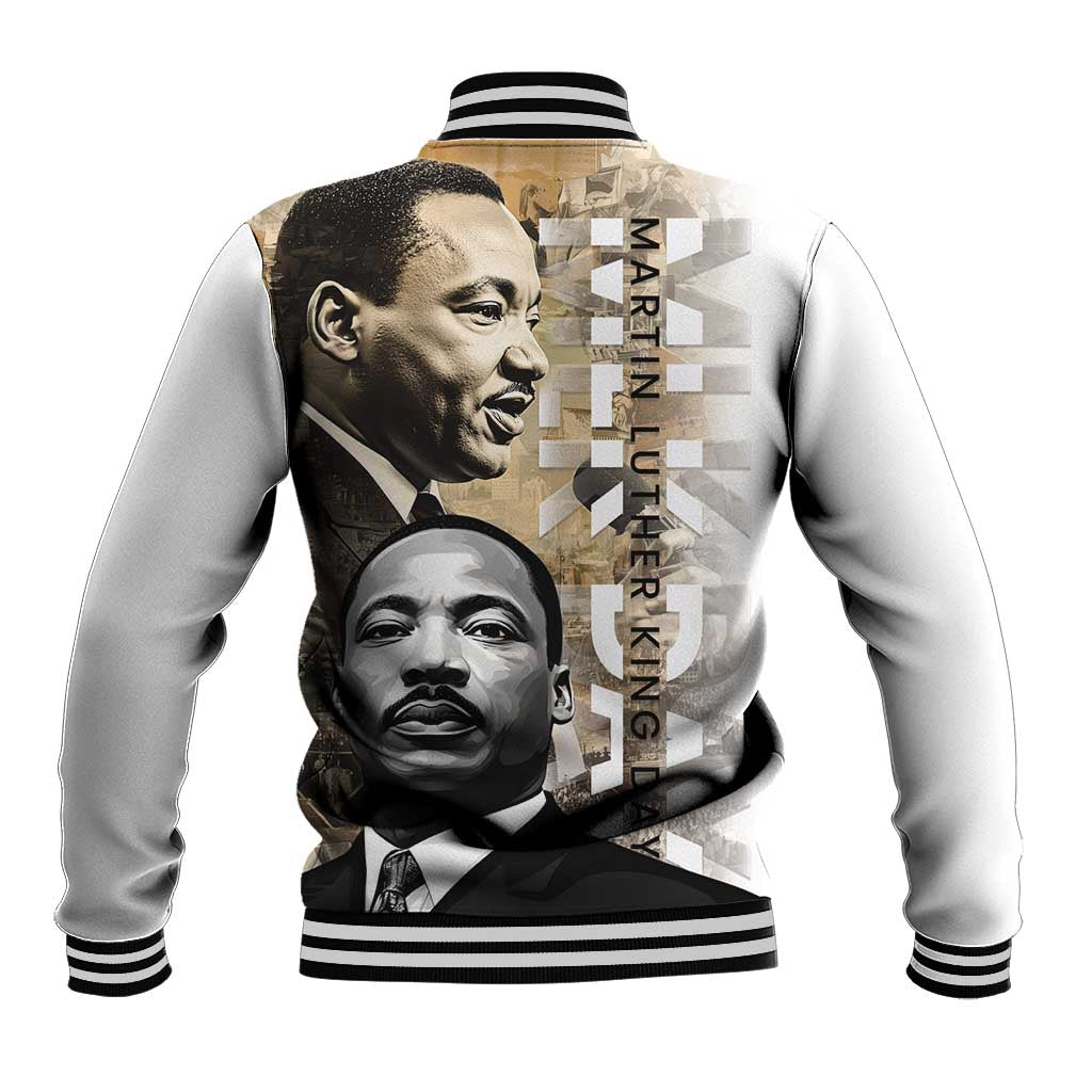 White unisex baseball jacket with black striped cuffs and vertical MLK poster-style graphic