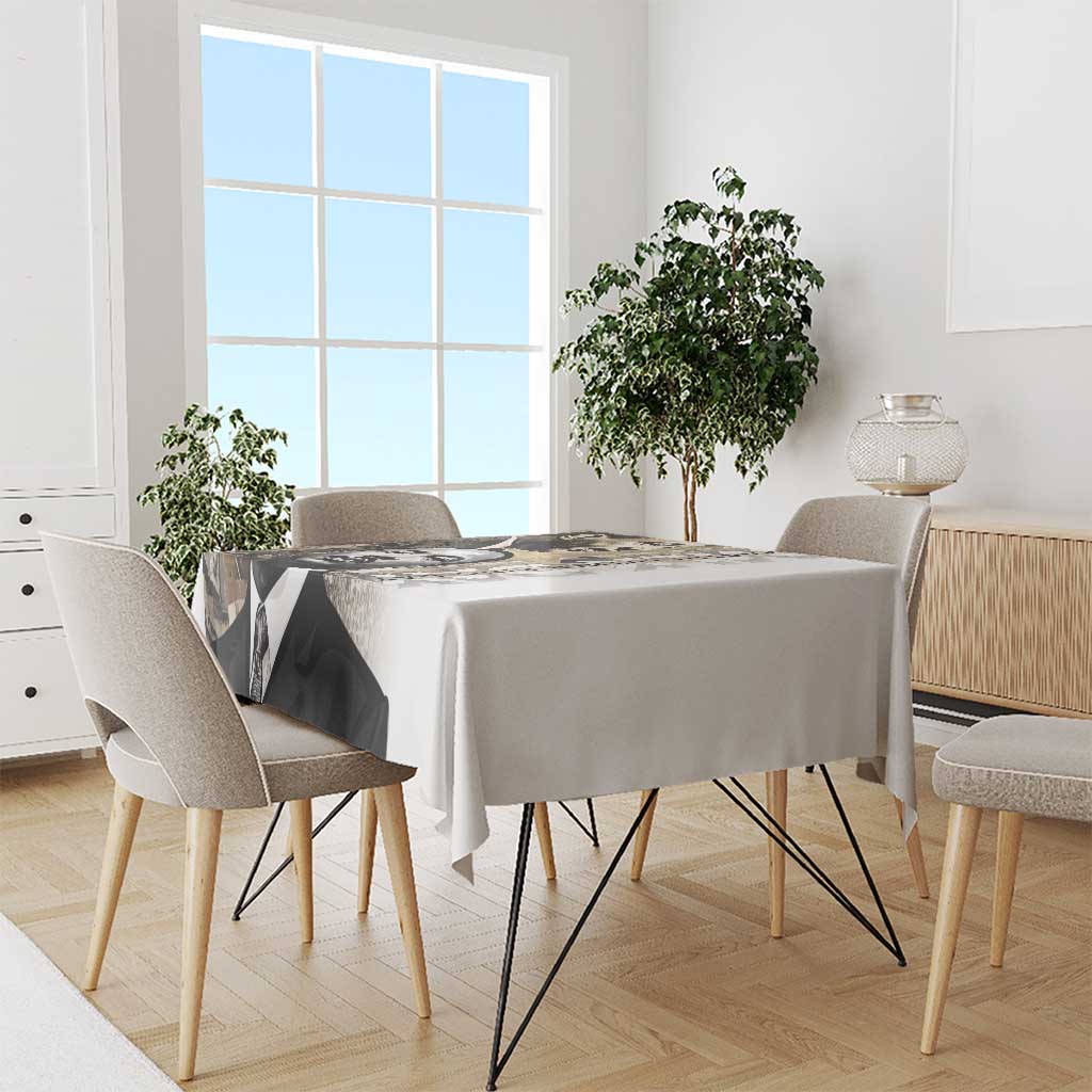 White tablecloth with black-and-white MLK portrait graphic, dining table centerpiece