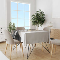 White tablecloth with black-and-white MLK portrait graphic, dining table centerpiece